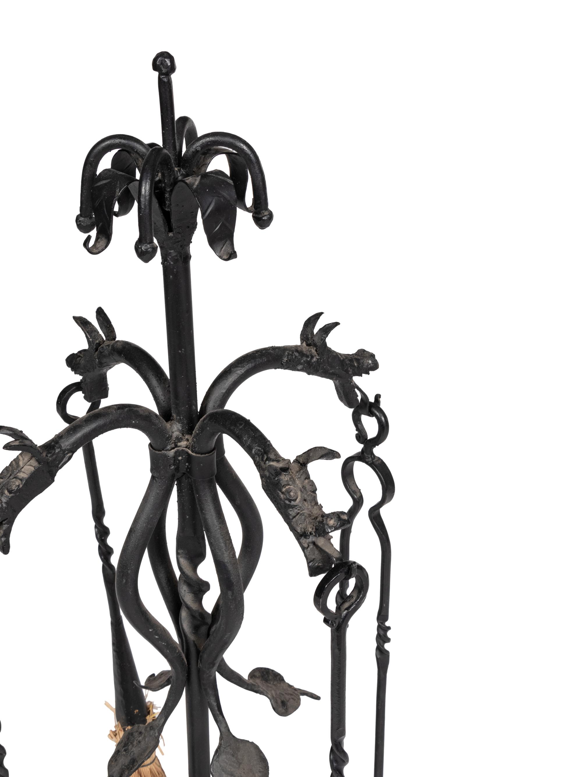 A Set of Iron Dragon Form Fireplace Tools
