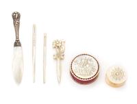 A Collection of Six Mother-of-Pearl Sewing Articles, , comprising a stiletto, thread winder, two bodkins and a pin cushion.
