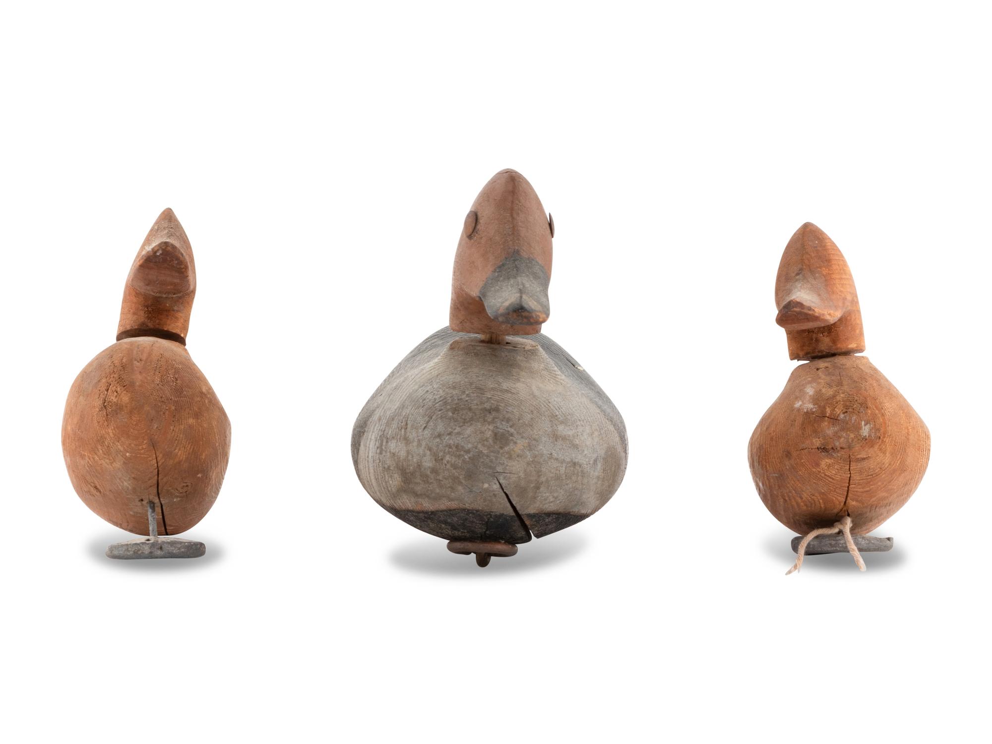 Three Diminutive Carved Wood Duck Decoys