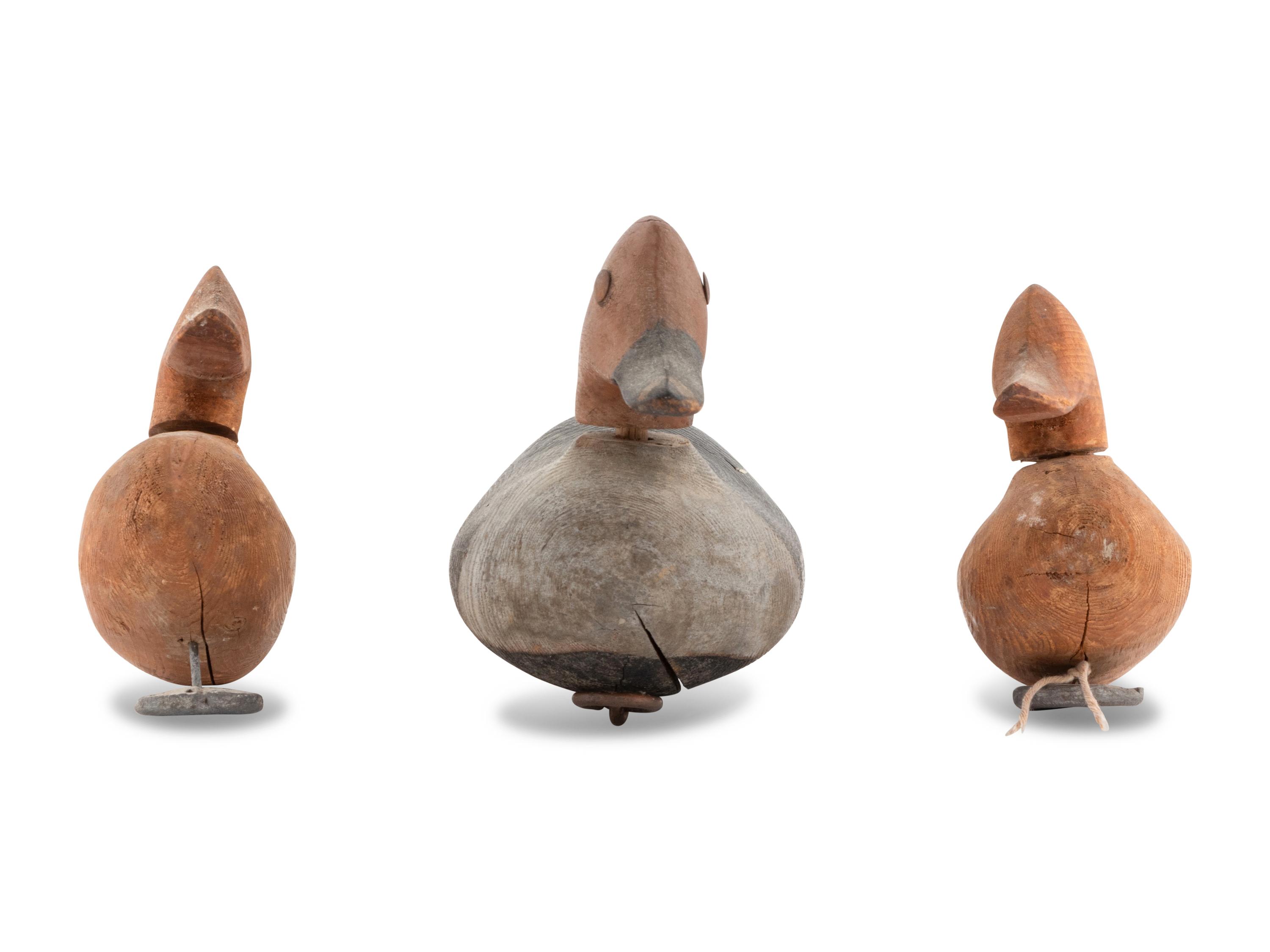 Three Diminutive Carved Wood Duck Decoys