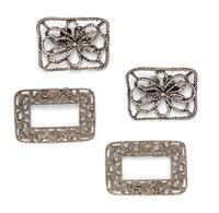 A Group of Silvertone Shoe Clips,