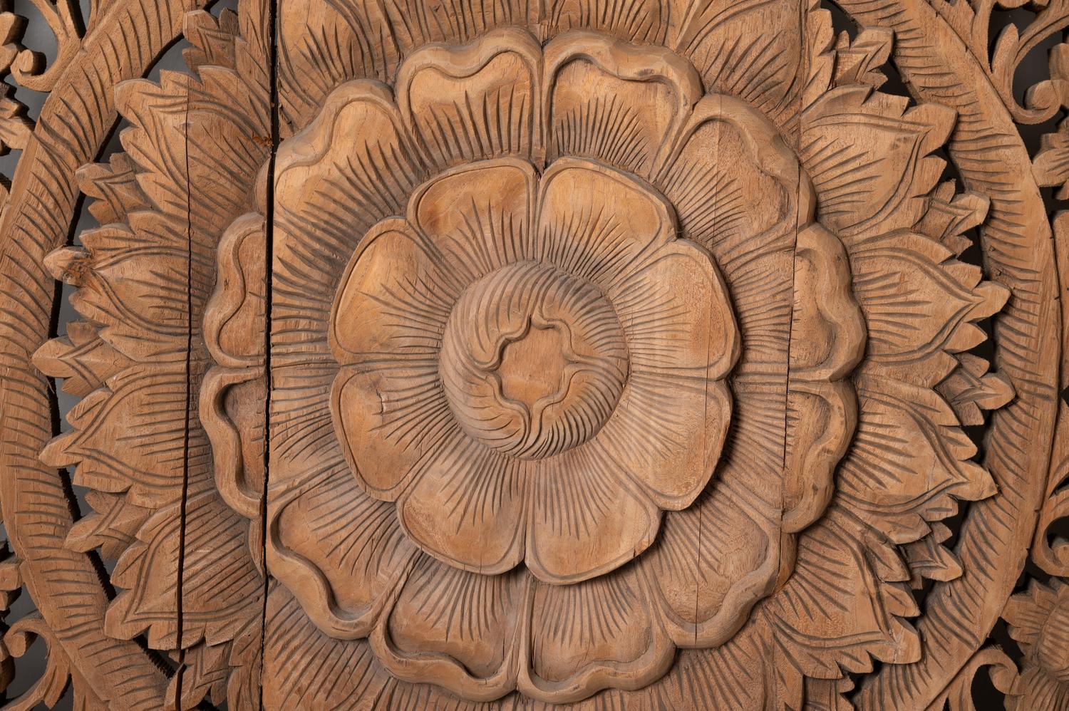 A Southeast Asian Carved Teakwood Mandala Panel