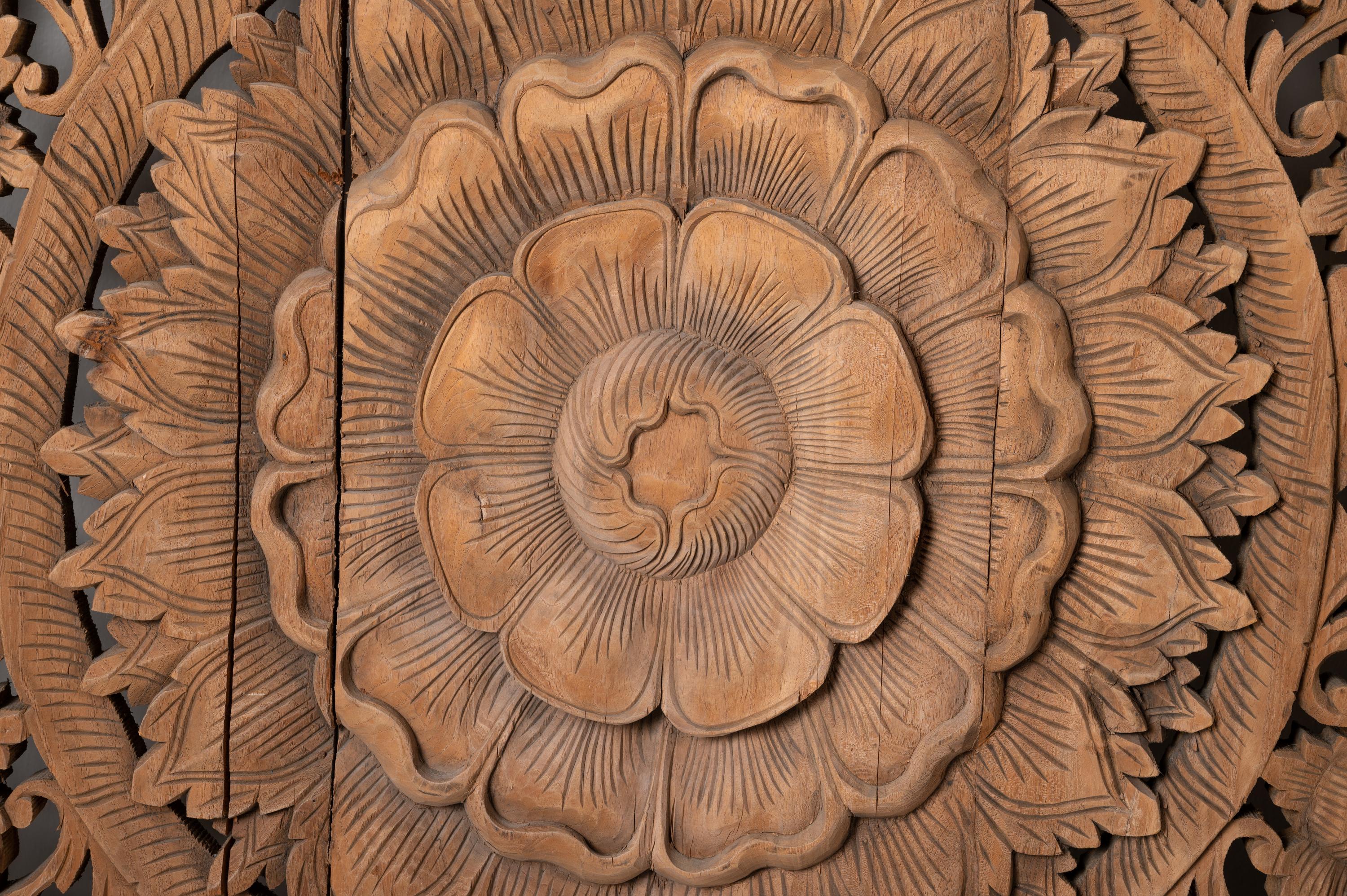 A Southeast Asian Carved Teakwood Mandala Panel