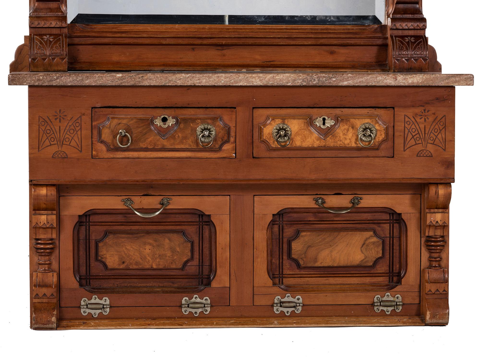 An Eastlake Style Hall Mirror with Marble Top Cabinet Base