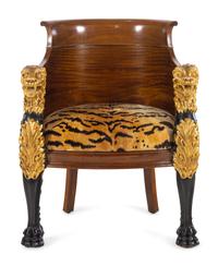 An Italian Empire Style Parcel Gilt Mahogany Armchair