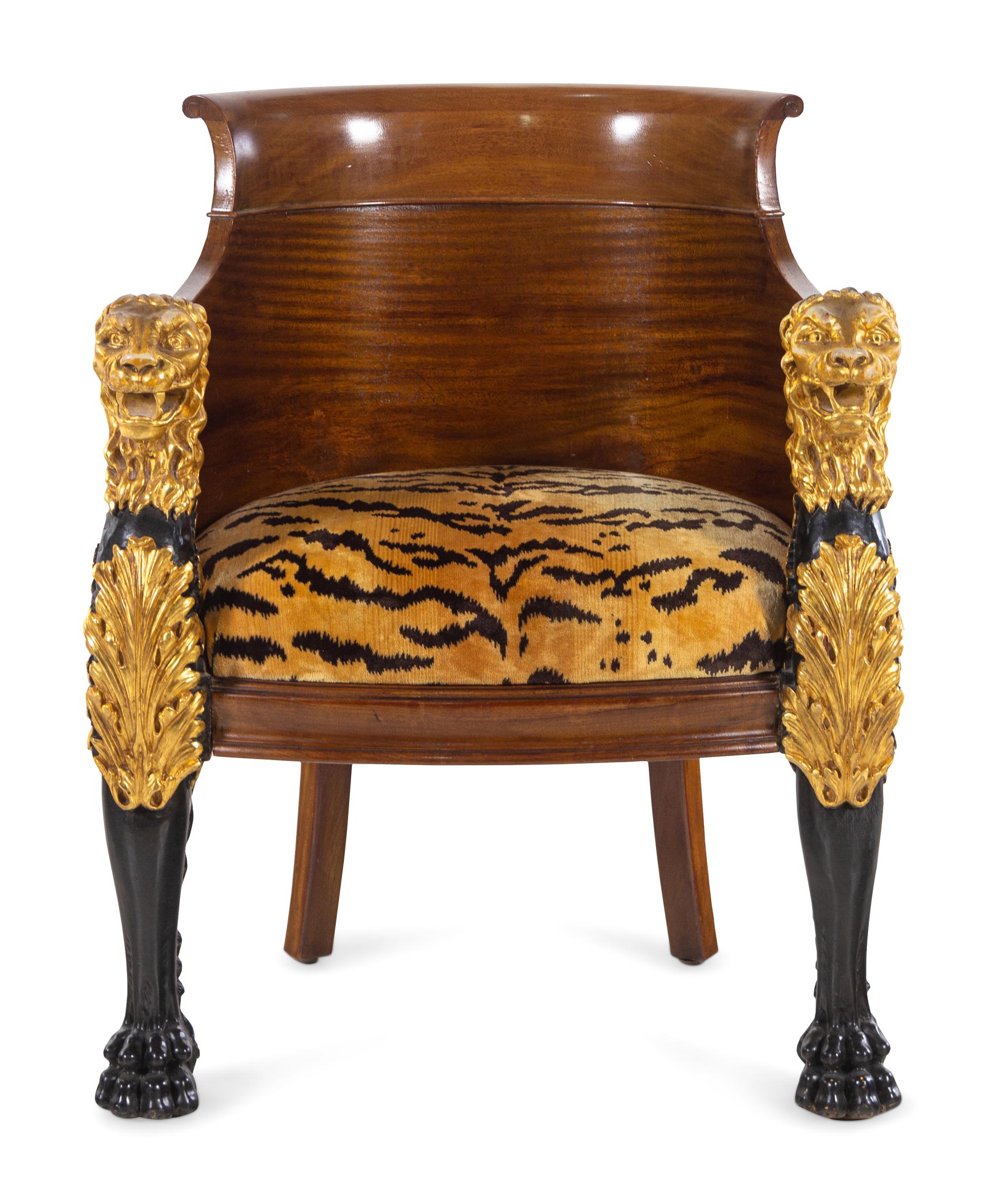 An Italian Empire Style Parcel Gilt Mahogany Armchair