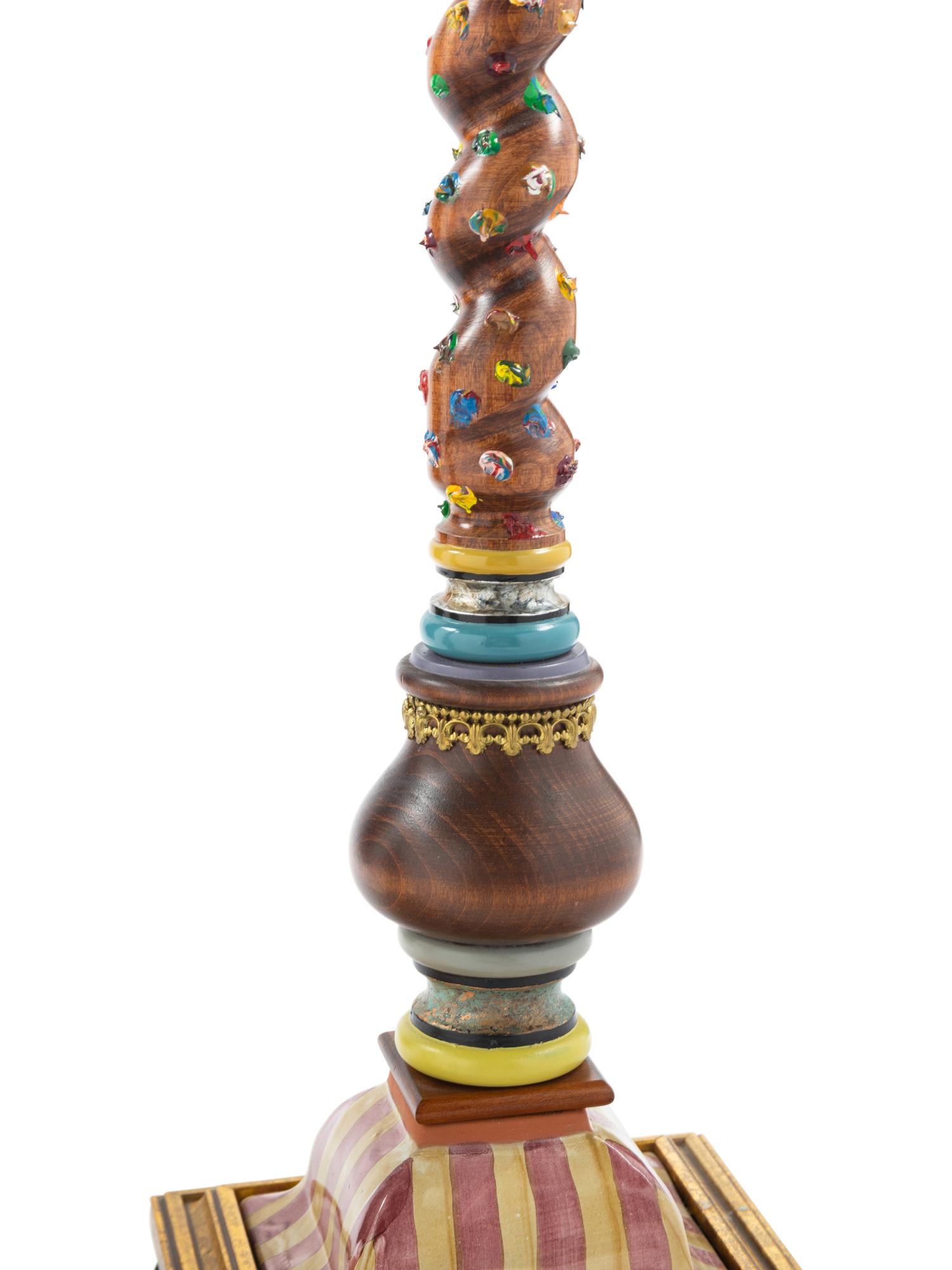 A Pair of MacKenzie-Childs Carved Wood and Ceramic-Mounted Candlesticks