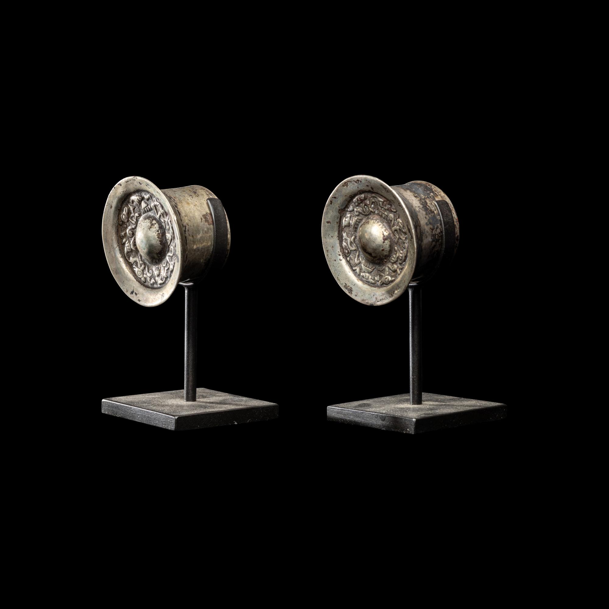 A Pair of Chimu Silver Ear Spools
