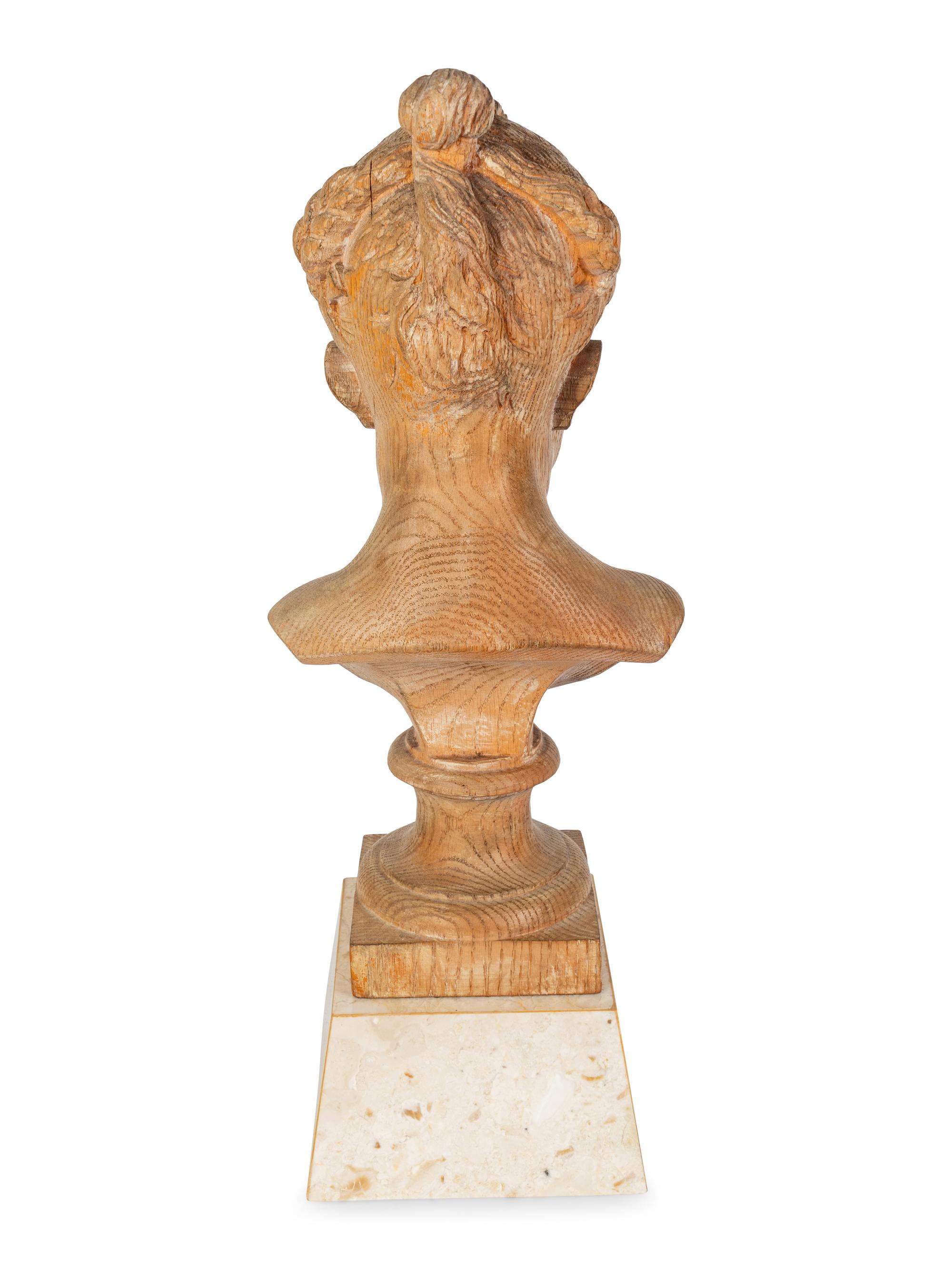 A French Carved Oak Portrait Bust of Young Girl — 20TH CENTURY