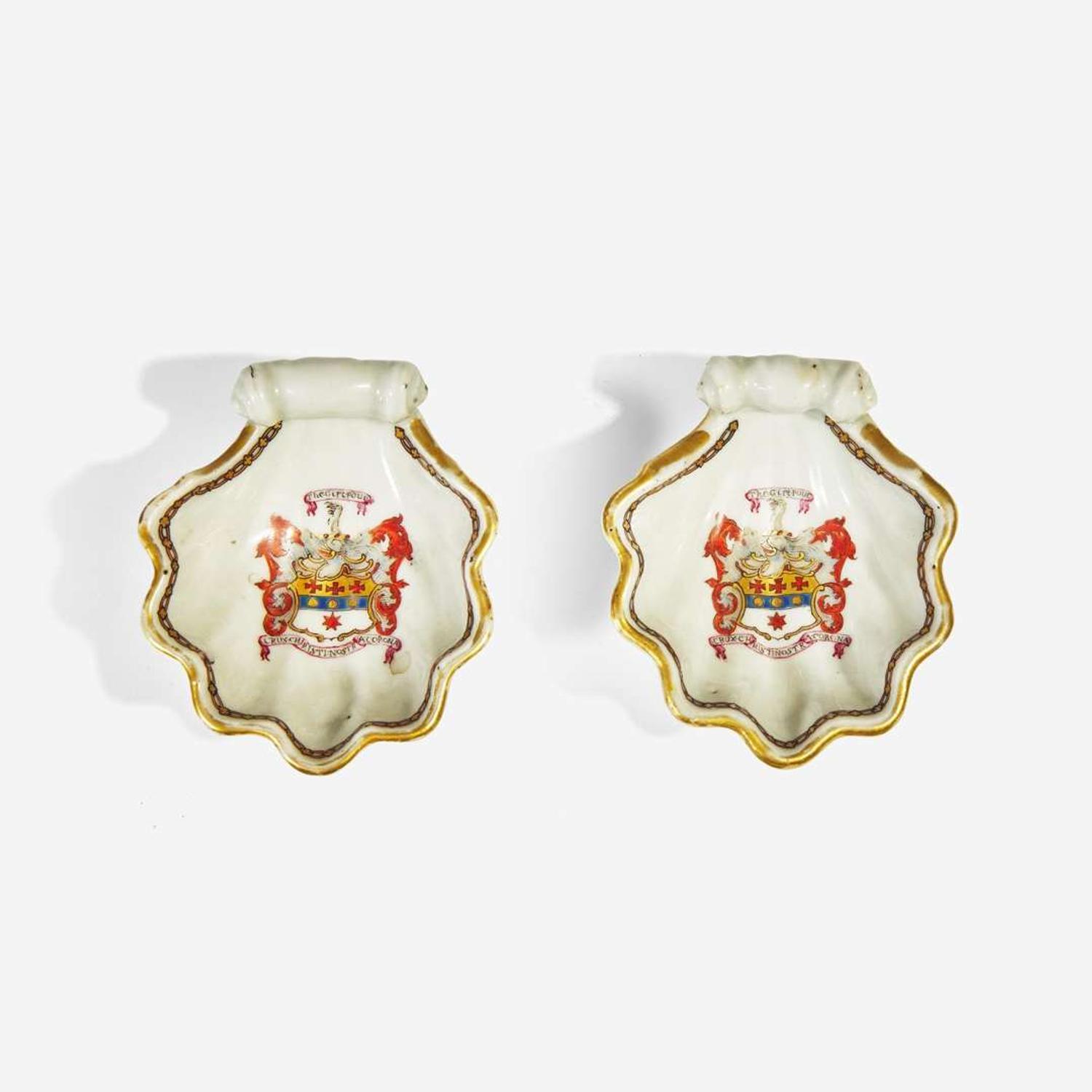 A Chinese Export porcelain blue and white candlestick with gilt decoration and pair of shell-form salts circa 1740-1755