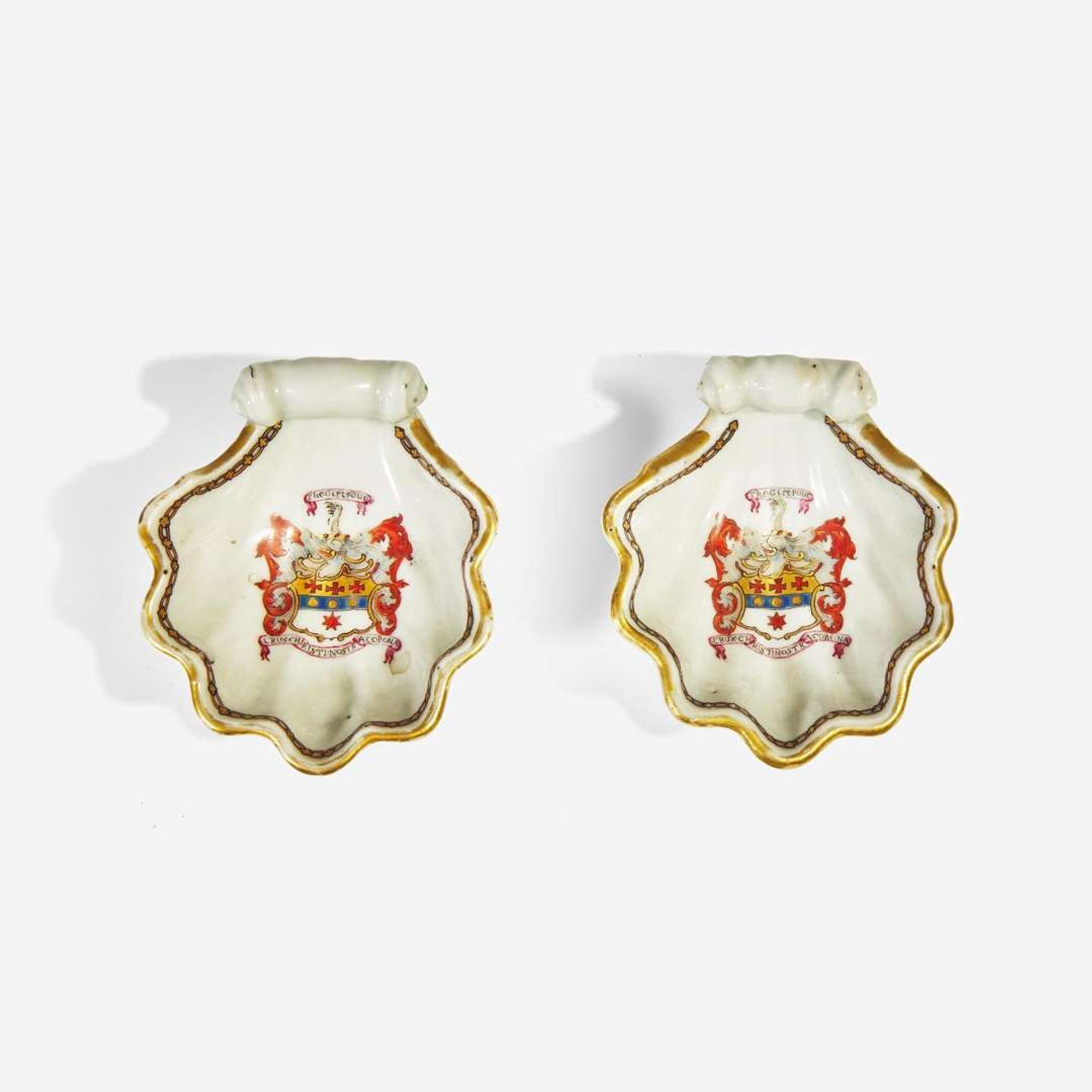 A Chinese Export porcelain blue and white candlestick with gilt decoration and pair of shell-form salts circa 1740-1755