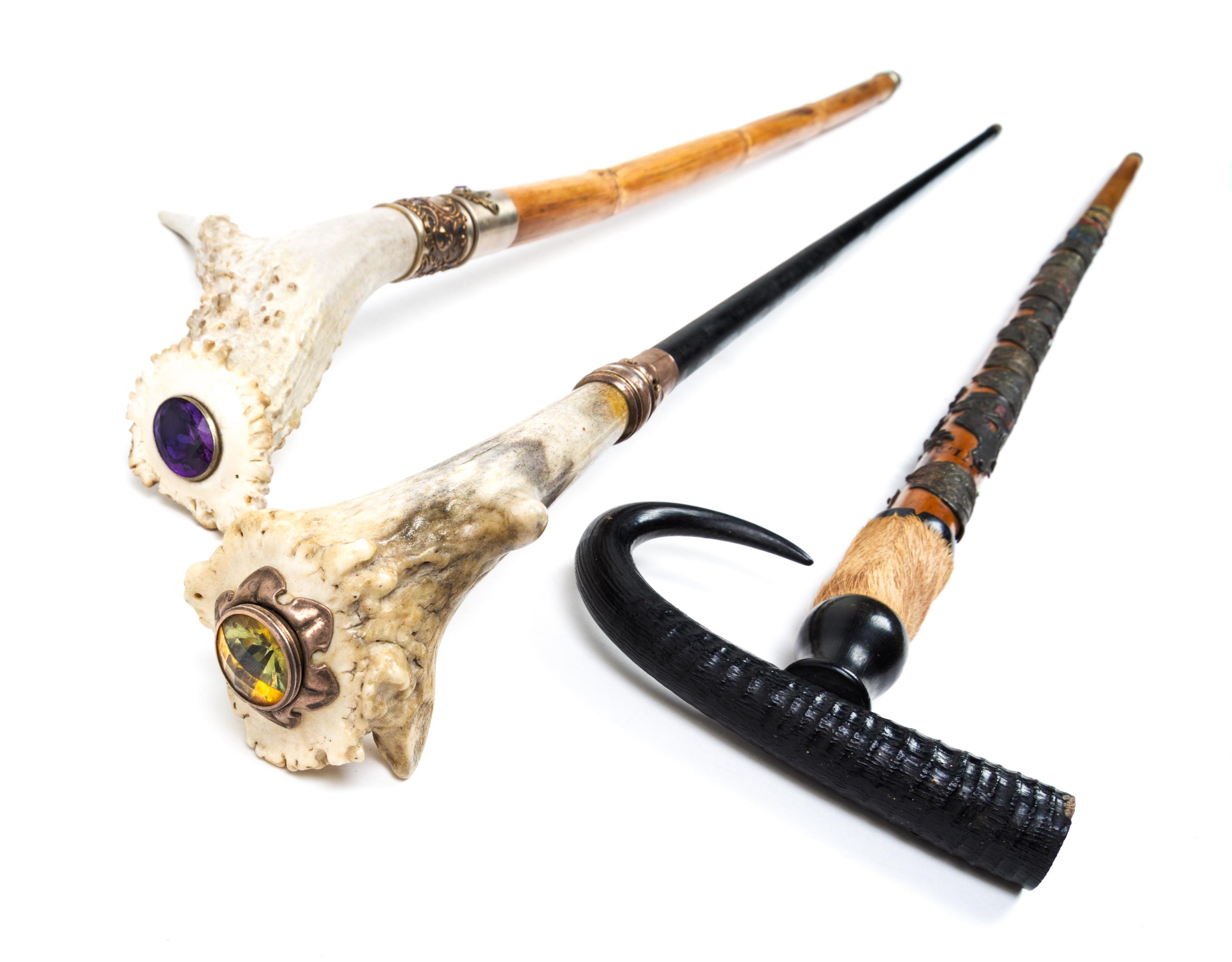 Three Sword Canes Length of longest 36 1/4 inches.