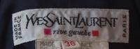 An Yves Saint Laurent Navy Wool Ribbed Skirt Suit, Size 38.