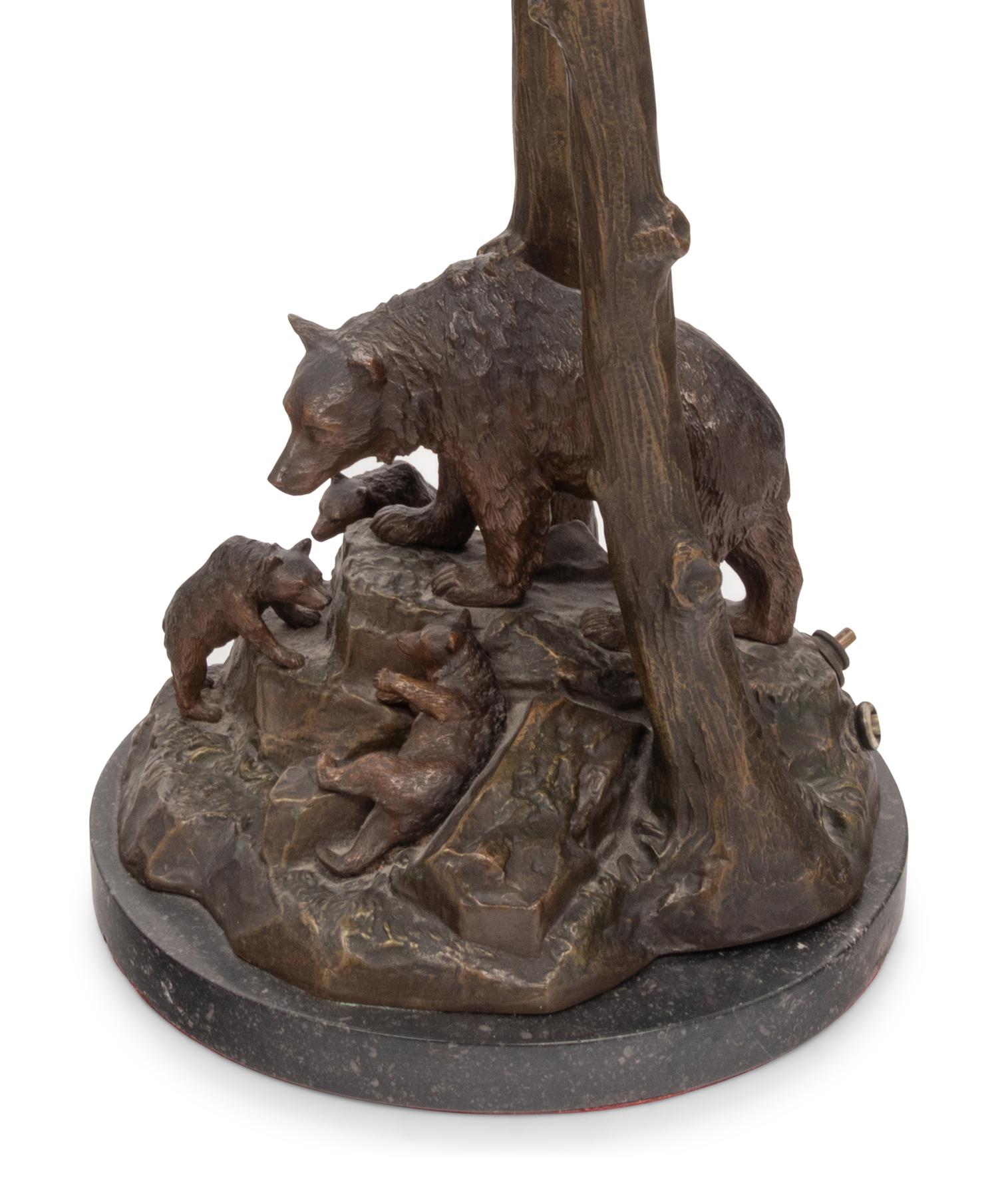 A Patinated Metal Figural Table Lamp