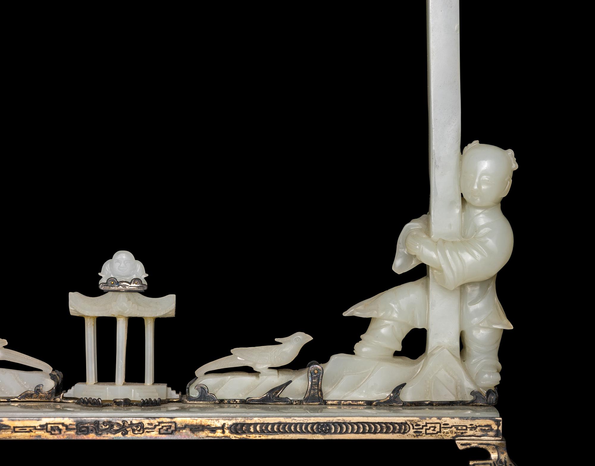 An Edward I. Farmer White Jade and Silver Mounted Chinoiserie Desk Clock, Circa 1930 Edward I. Farmer約1930年製中國風白玉童子座鐘