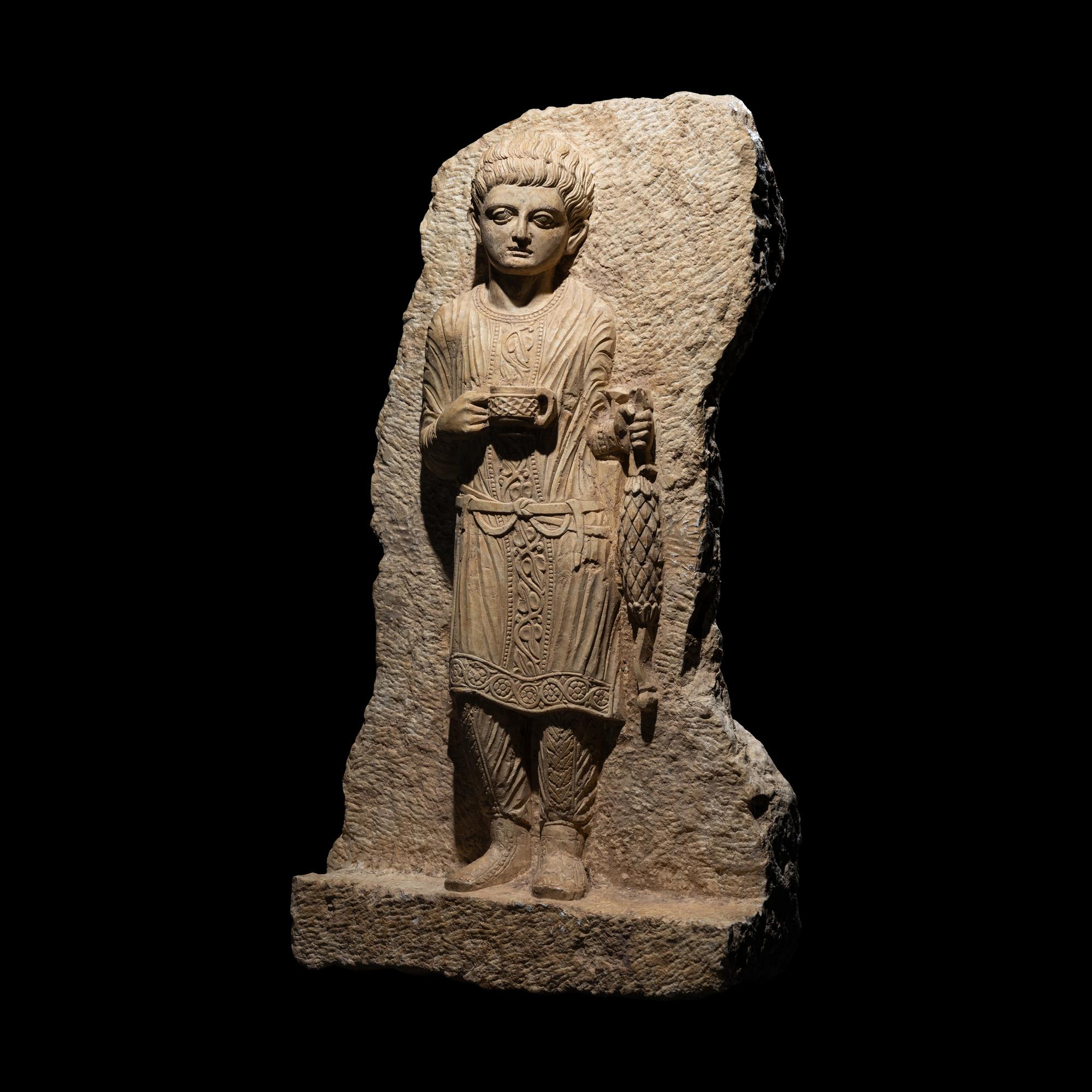 A Palmyrene Limestone Relief Fragment of a Youth