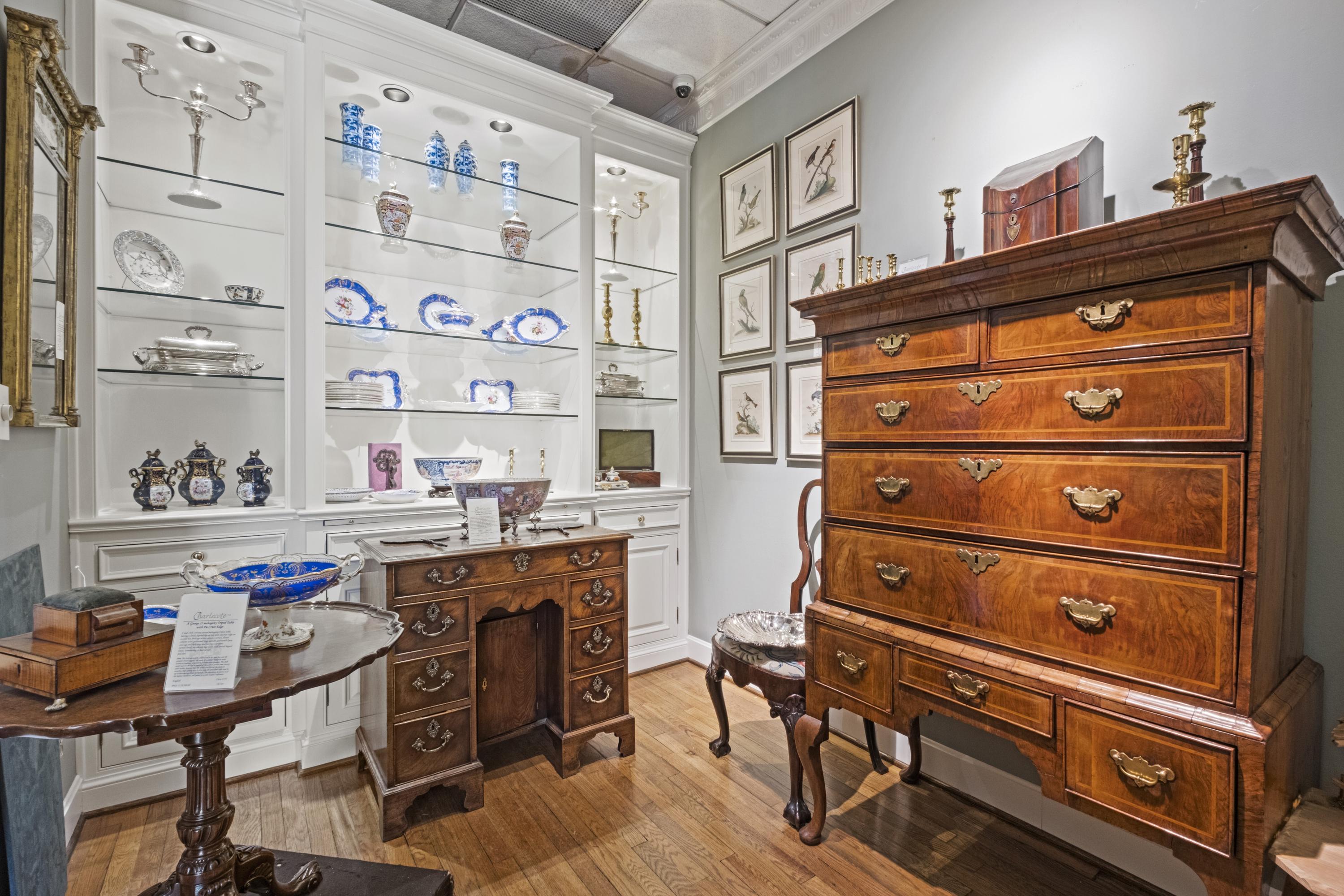 A George II Walnut and Parcel Gilt Girandole Mirror