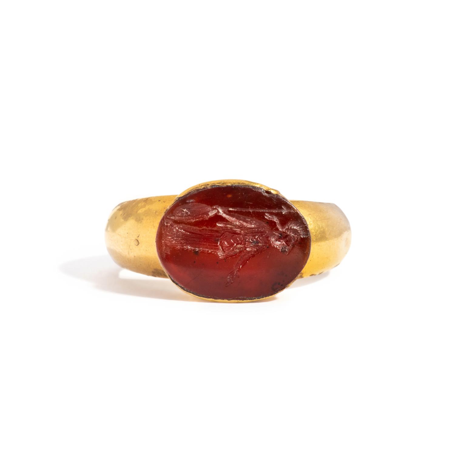 A Roman Gold and Carnelian Finger Ring with the Goddess Minerva