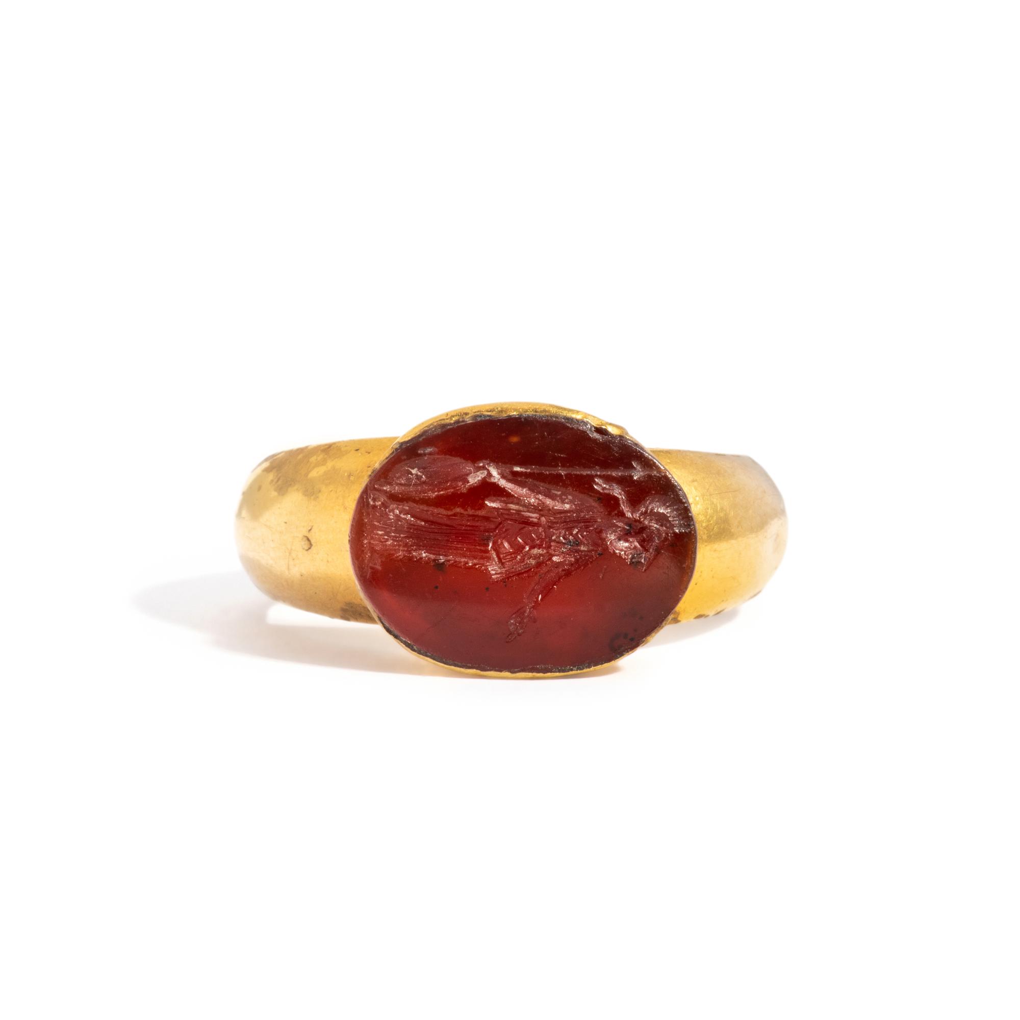 A Roman Gold and Carnelian Finger Ring with the Goddess Minerva
