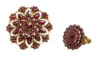A Collection of 14 Karat Yellow Gold and Garnet Jewelry, 9.40 dwts.