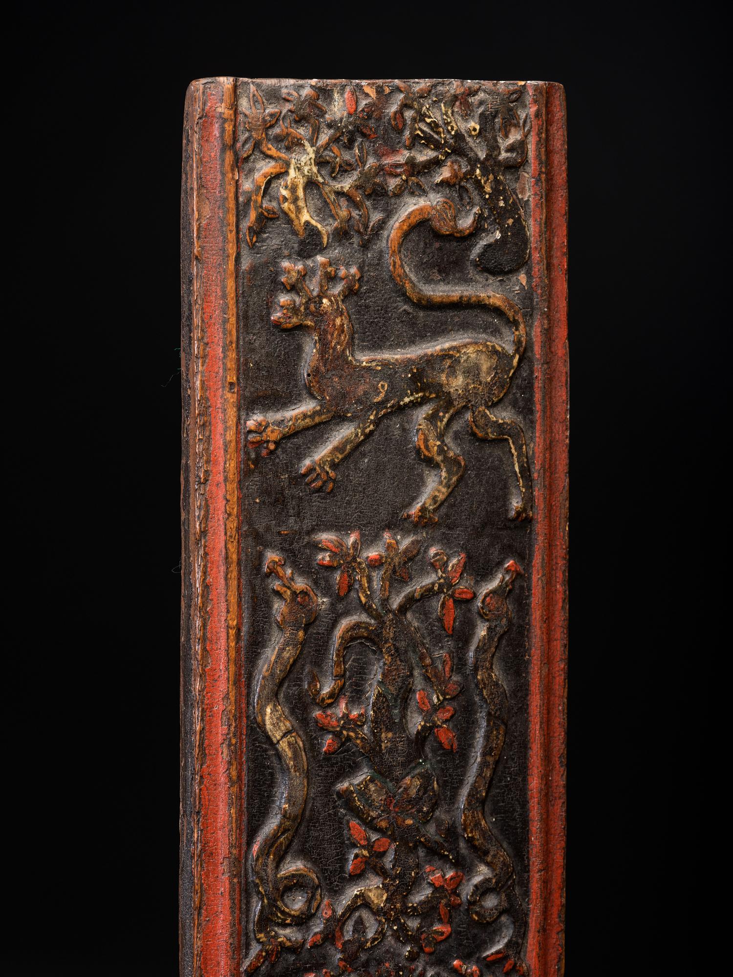 A Scandinavian Carved and Painted Maple Mangle Board