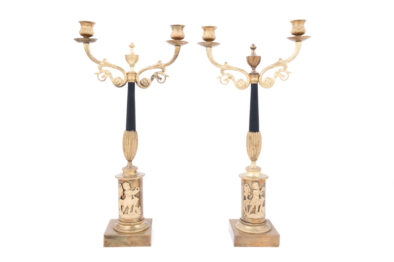 A Pair of French Gilt and Patinated Bronze Two-Light Candelabra