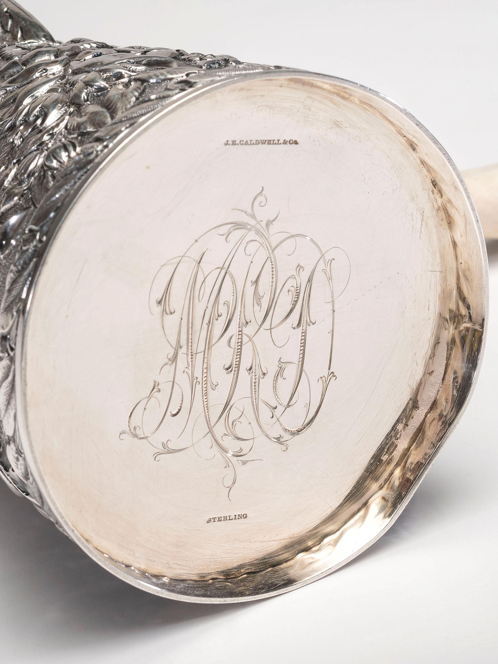 An American Silver Repoussé Chocolate Pot