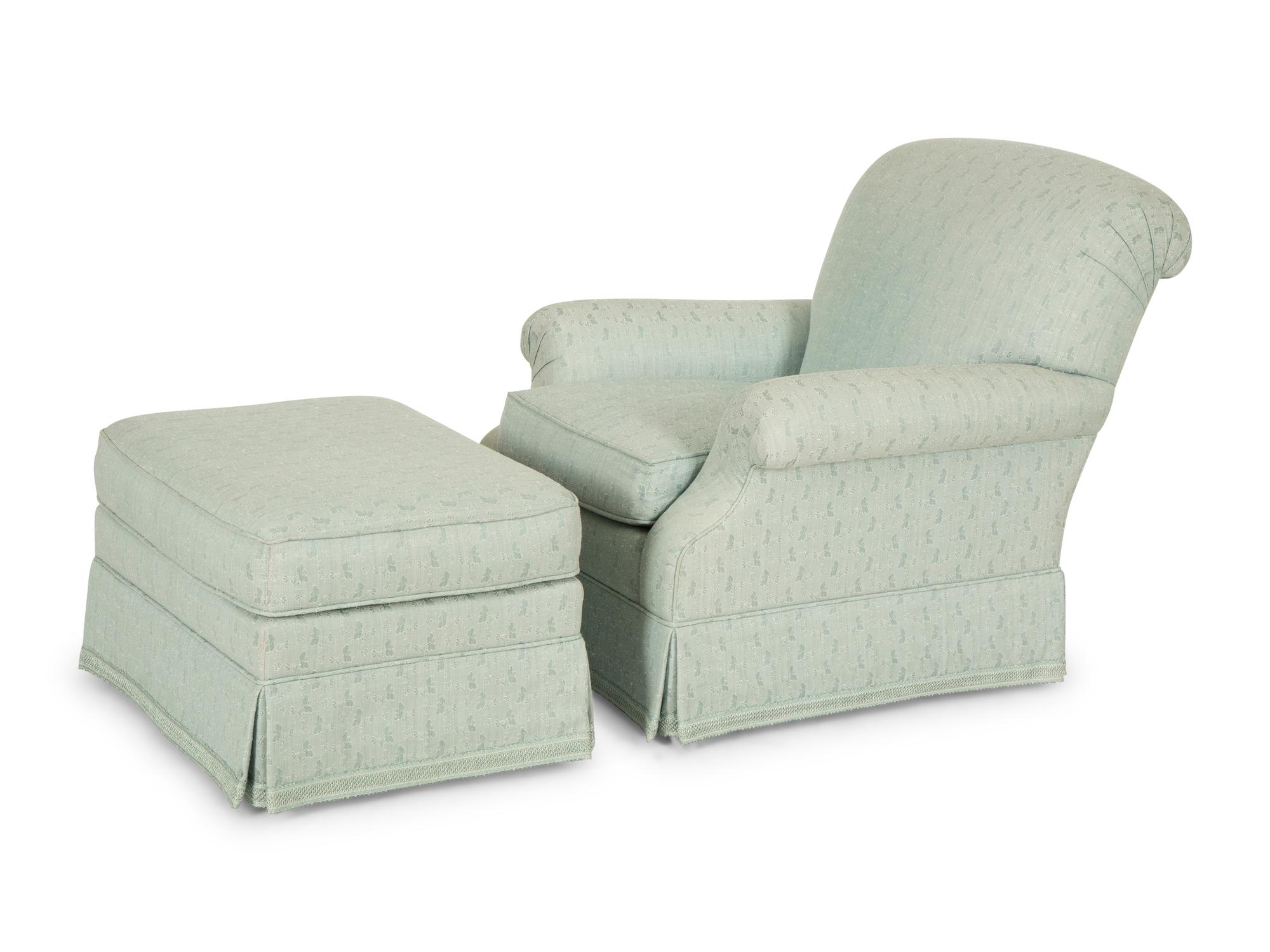 A Pale Blue Upholstered Club Chair with Matching Ottoman