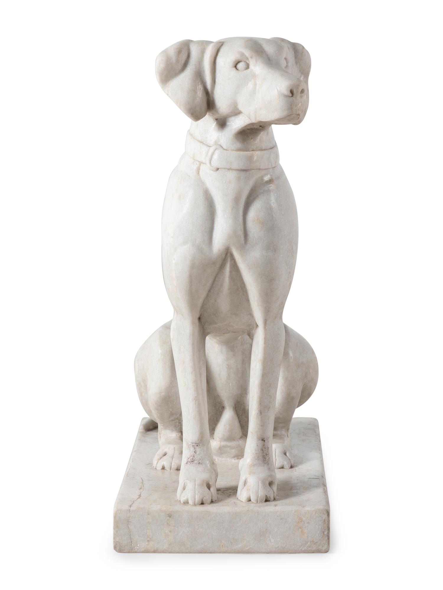 A Composition Marble Seated Dog
