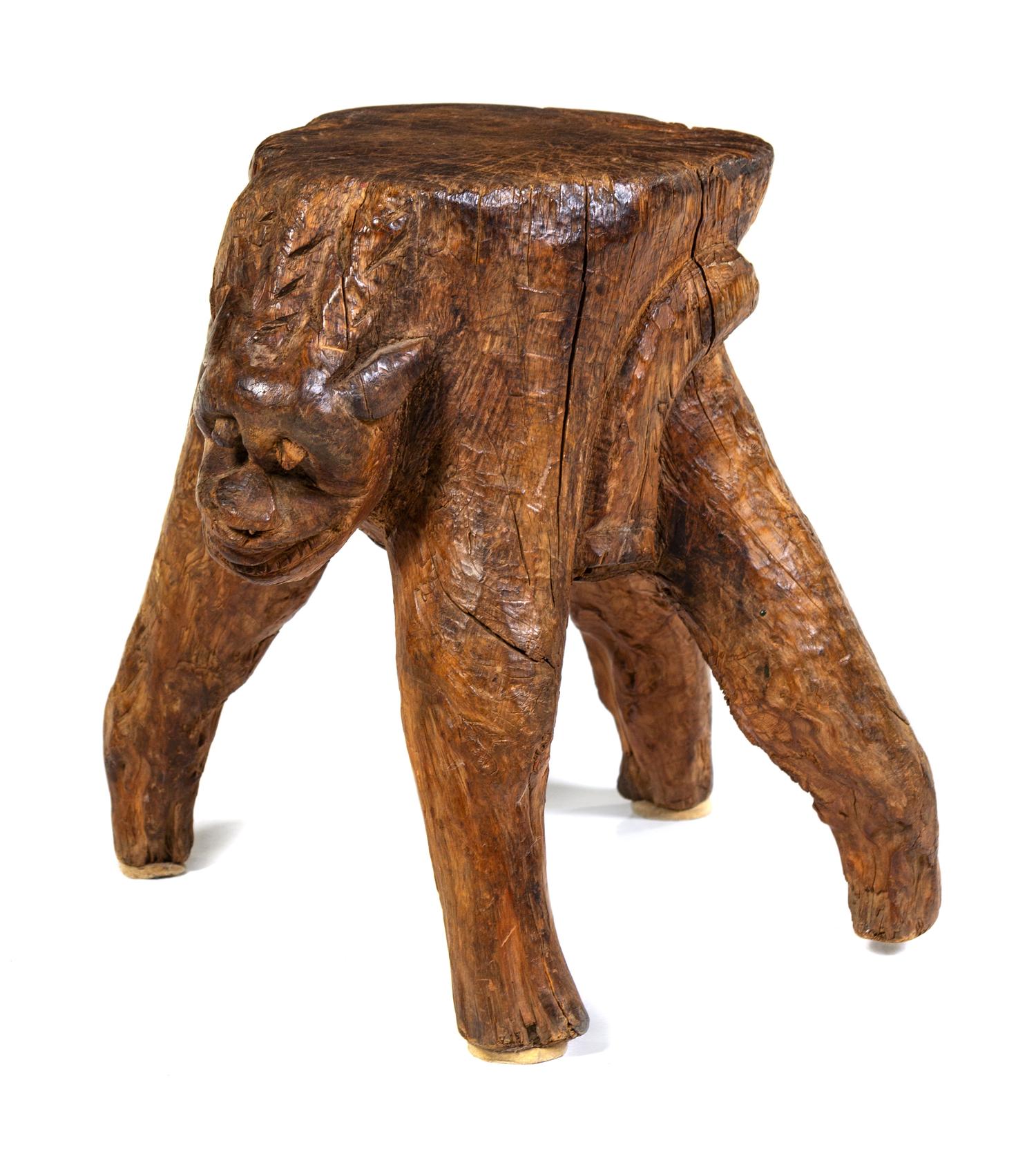 A Carved Foot Stool Height 14 1/4 inches.