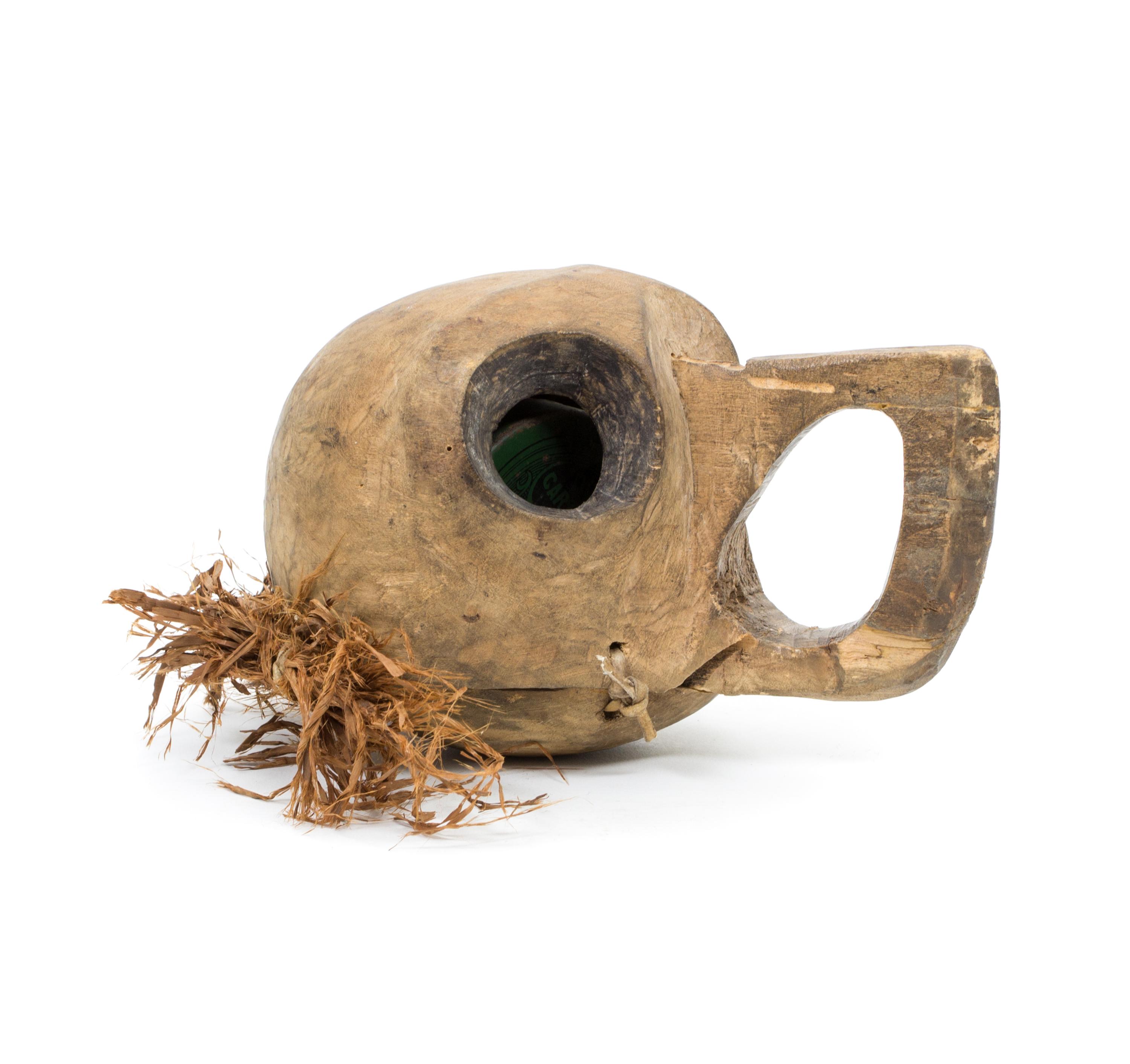 A Kwakwaka'wakw, Quatsino Band Raven's Head Rattle Length 6 x height 4 inches.
