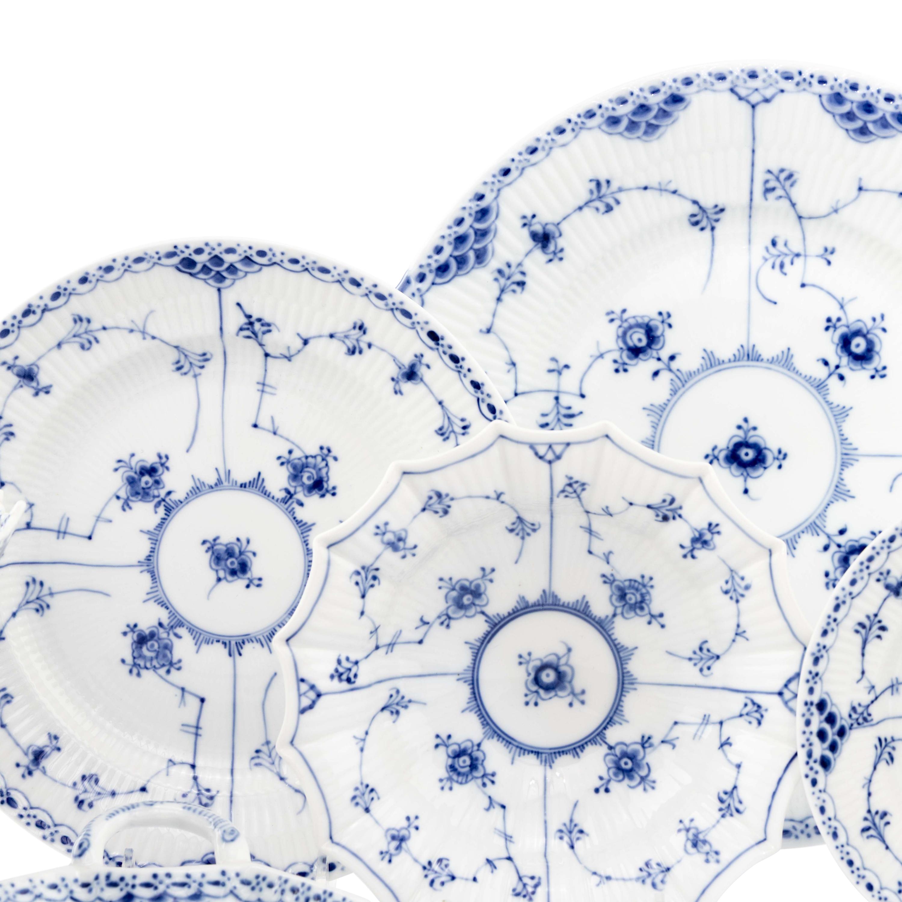 A Royal Copenhagen Blue Fluted Half Lace Porcelain Luncheon Service