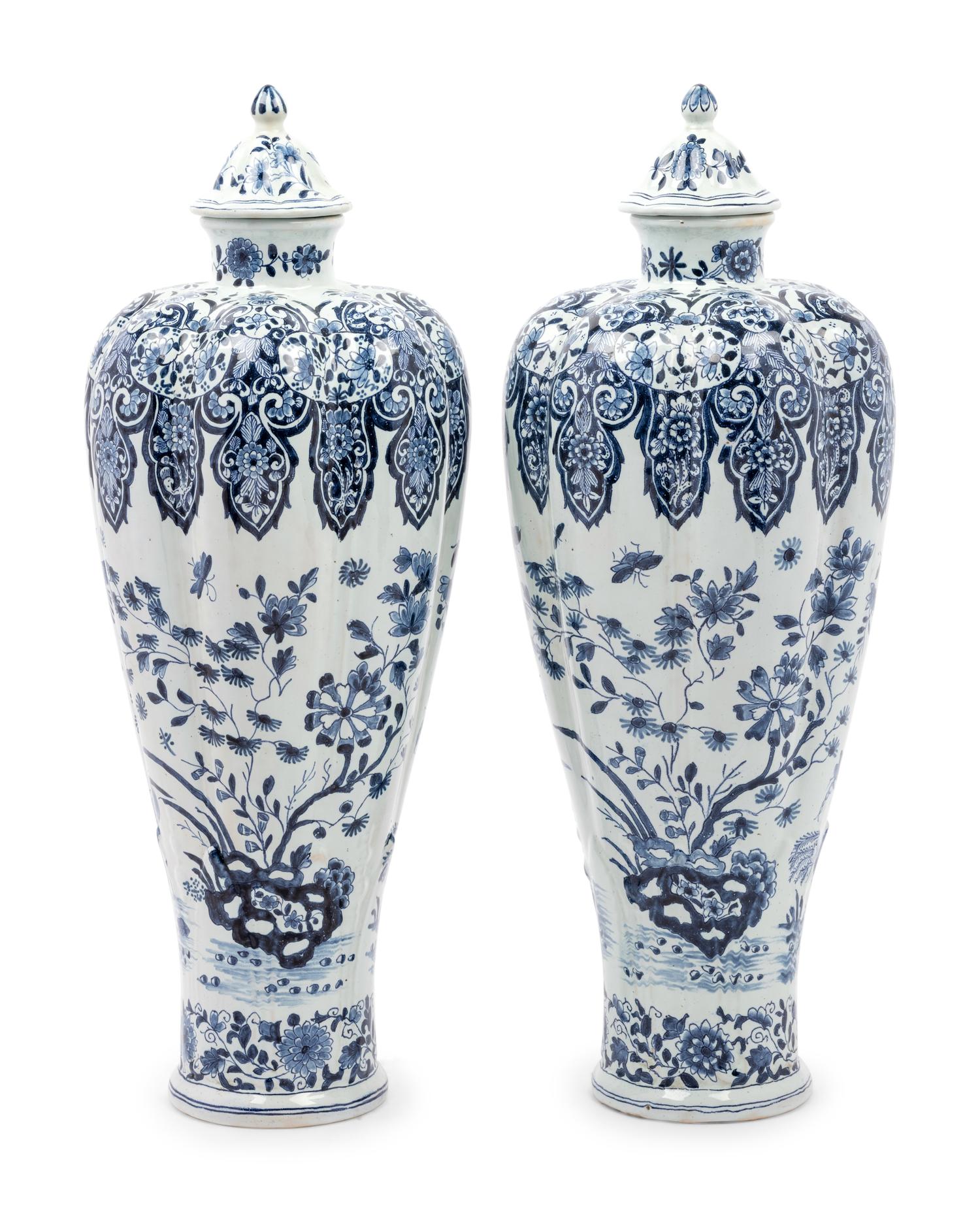 A Pair of Delft Covered Vases