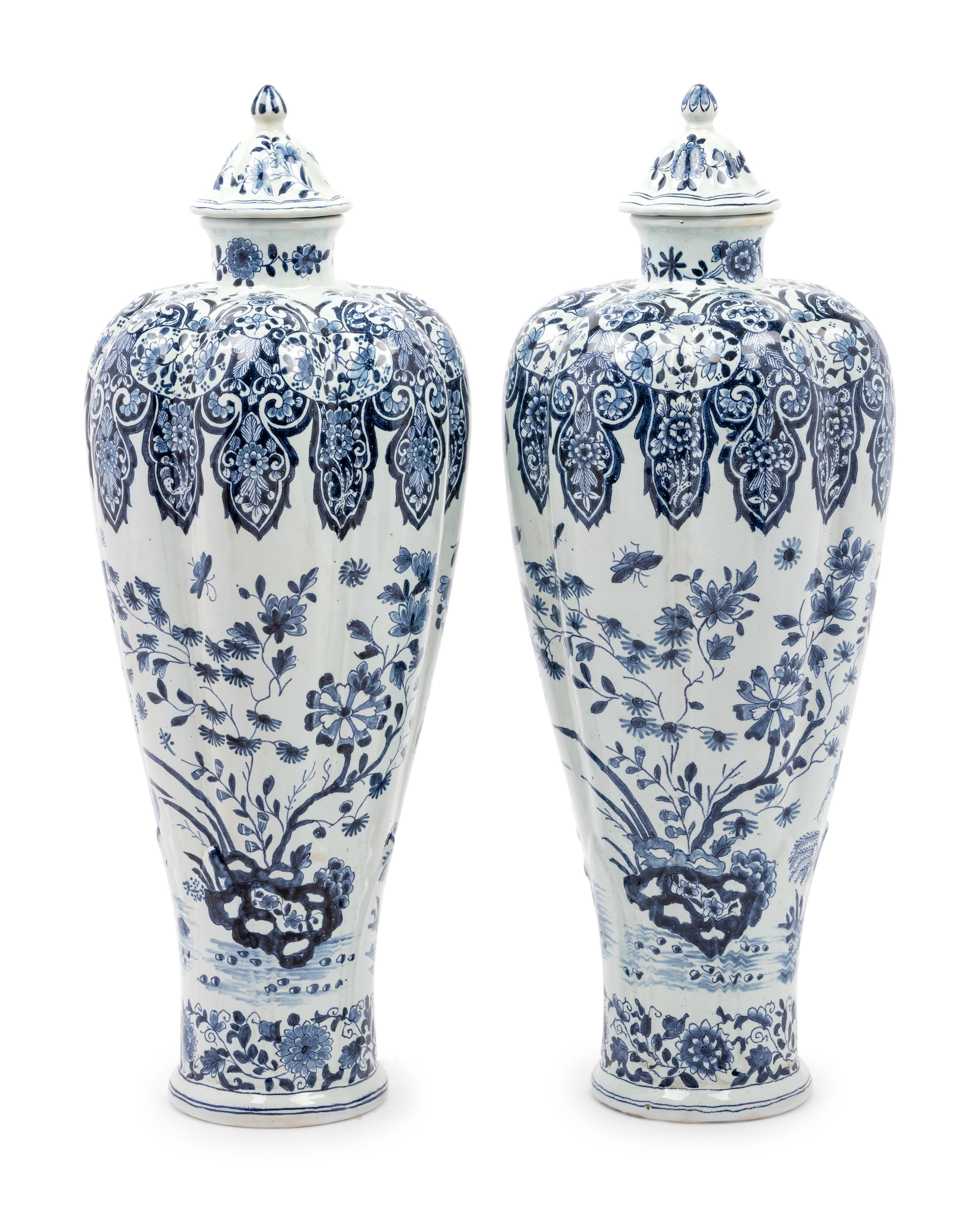 A Pair of Delft Covered Vases