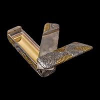 A Chinese Parcel-Gilt Silver Repoussé 'Plantain Leaves' Rectangular Scroll Box, Incised Qianlong Mark 清乾隆乙卯（1796）銀鎏金鏨蕉葉紋手卷機關盒