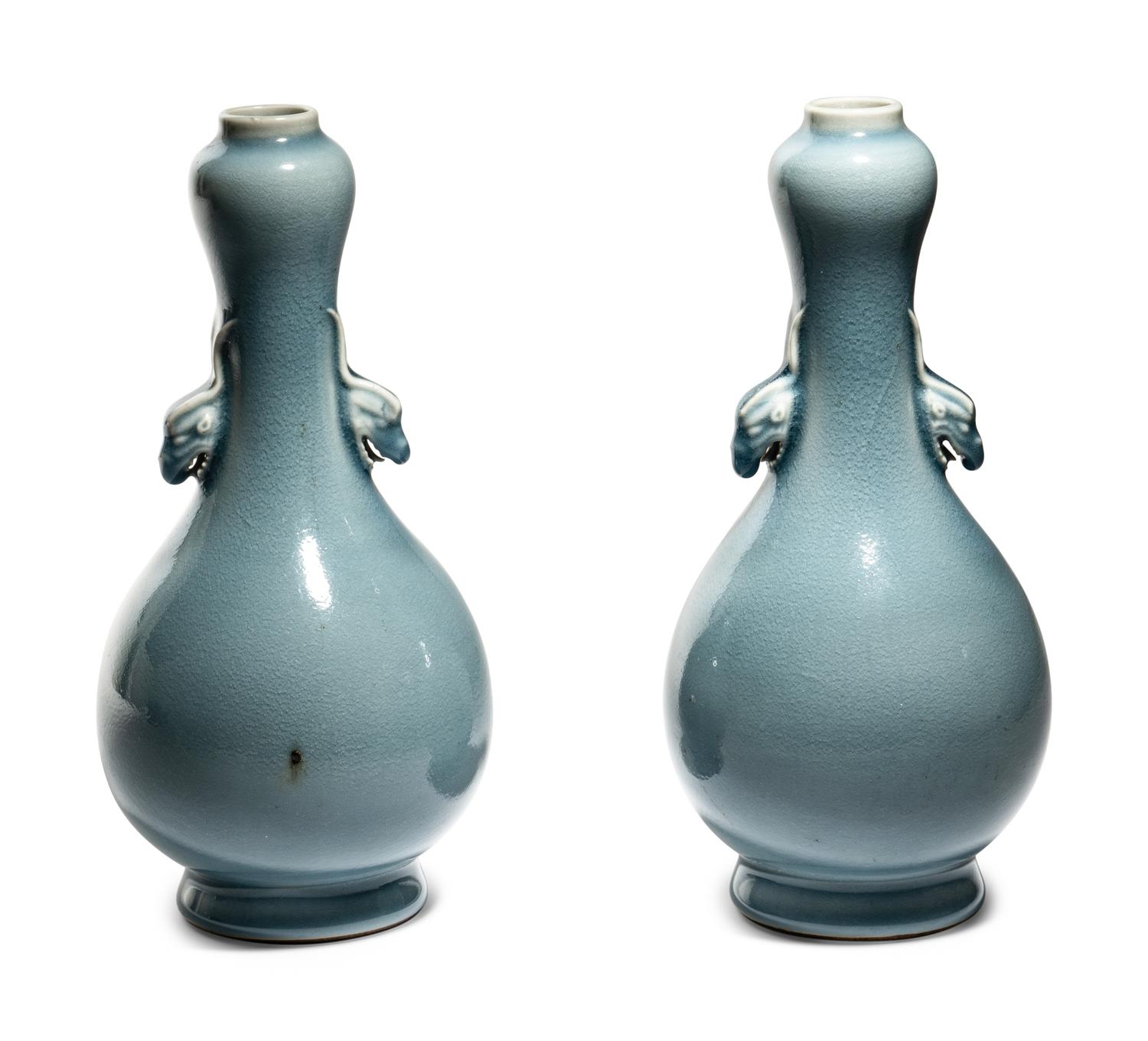 A Pair of Clair-de-Lune Glazed Porcelain 'Garlic Head' Bottle Vases