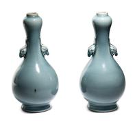 A Pair of Clair-de-Lune Glazed Porcelain 'Garlic Head' Bottle Vases