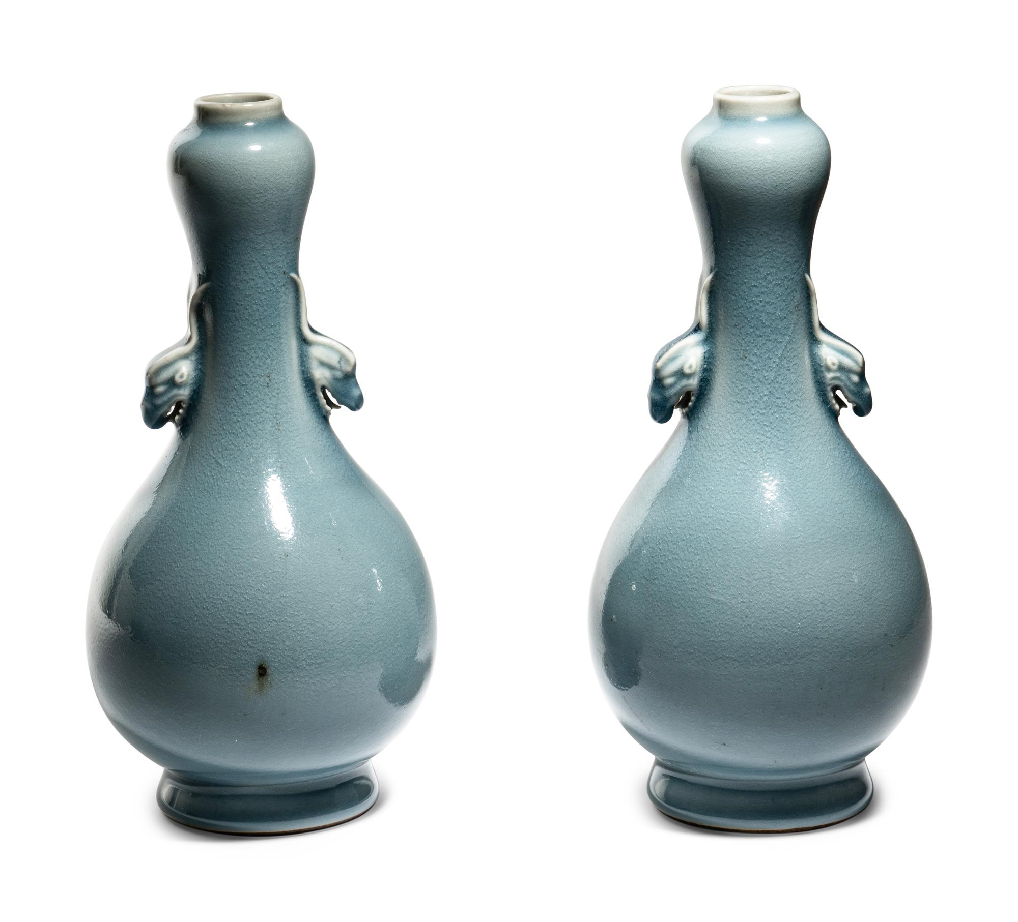 A Pair of Clair-de-Lune Glazed Porcelain 'Garlic Head' Bottle Vases