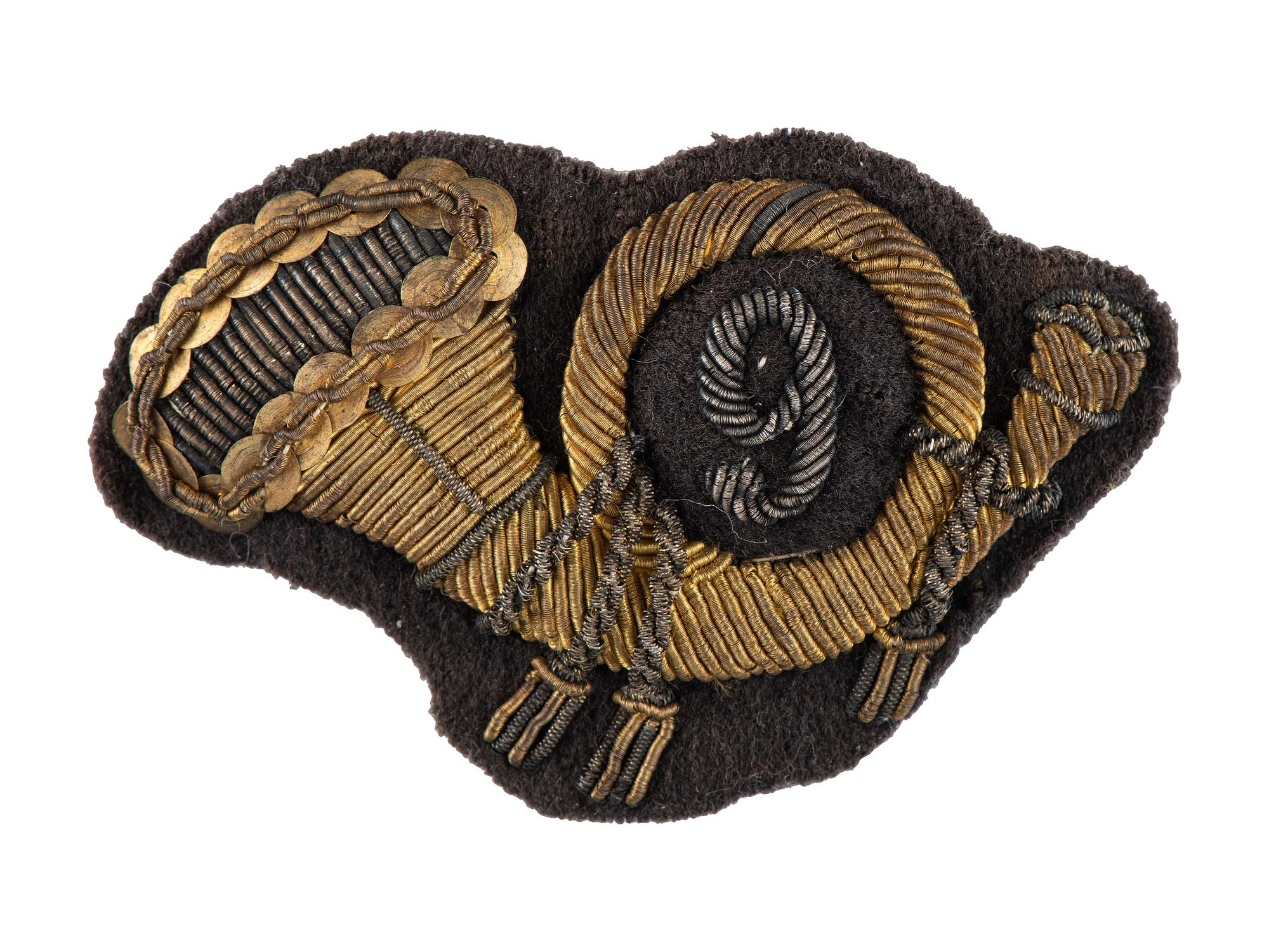 [CIVIL WAR]. Federal infantry headgear insignia with regimental number "9."