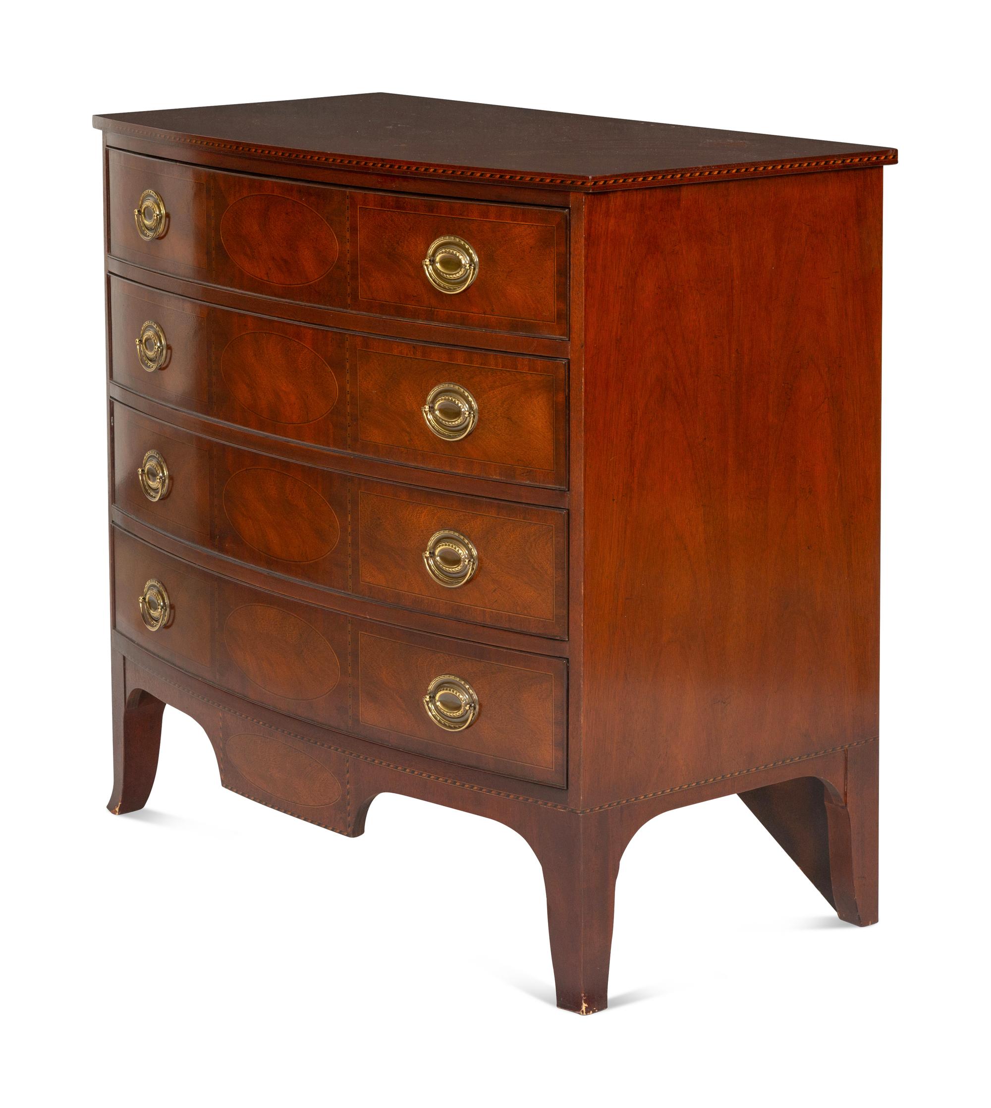 A Pair of Federal Style Mahogany Bow-Front Chests
