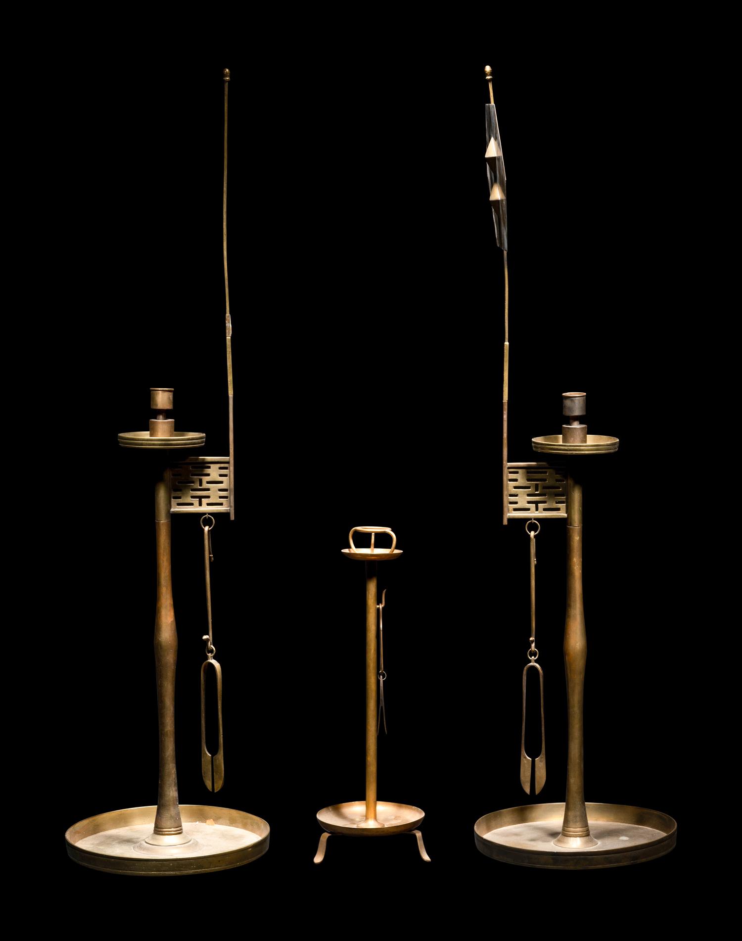 Three Chinese Copper Candlesticks