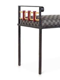 An Upholstered Metal Bench