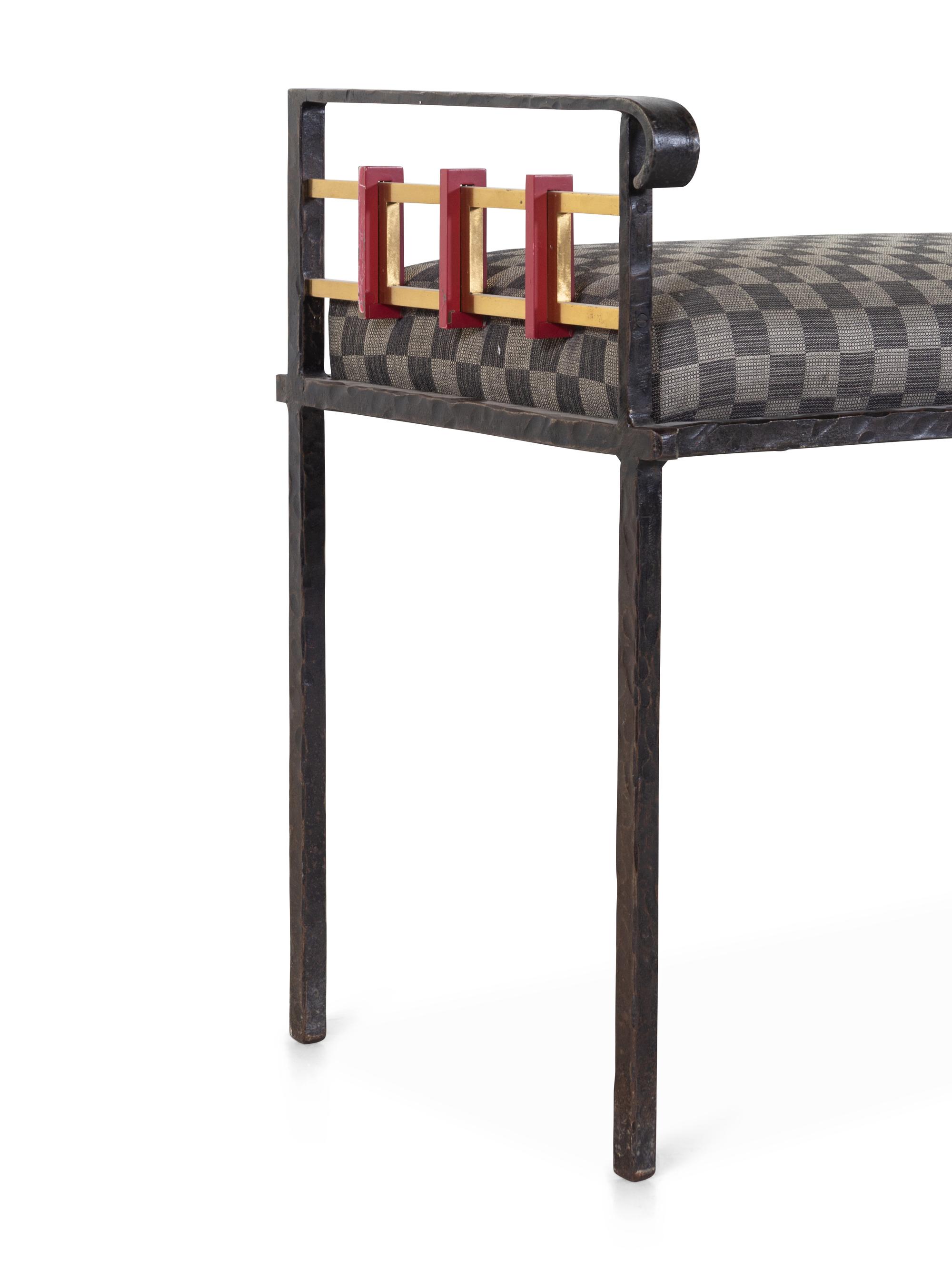An Upholstered Metal Bench