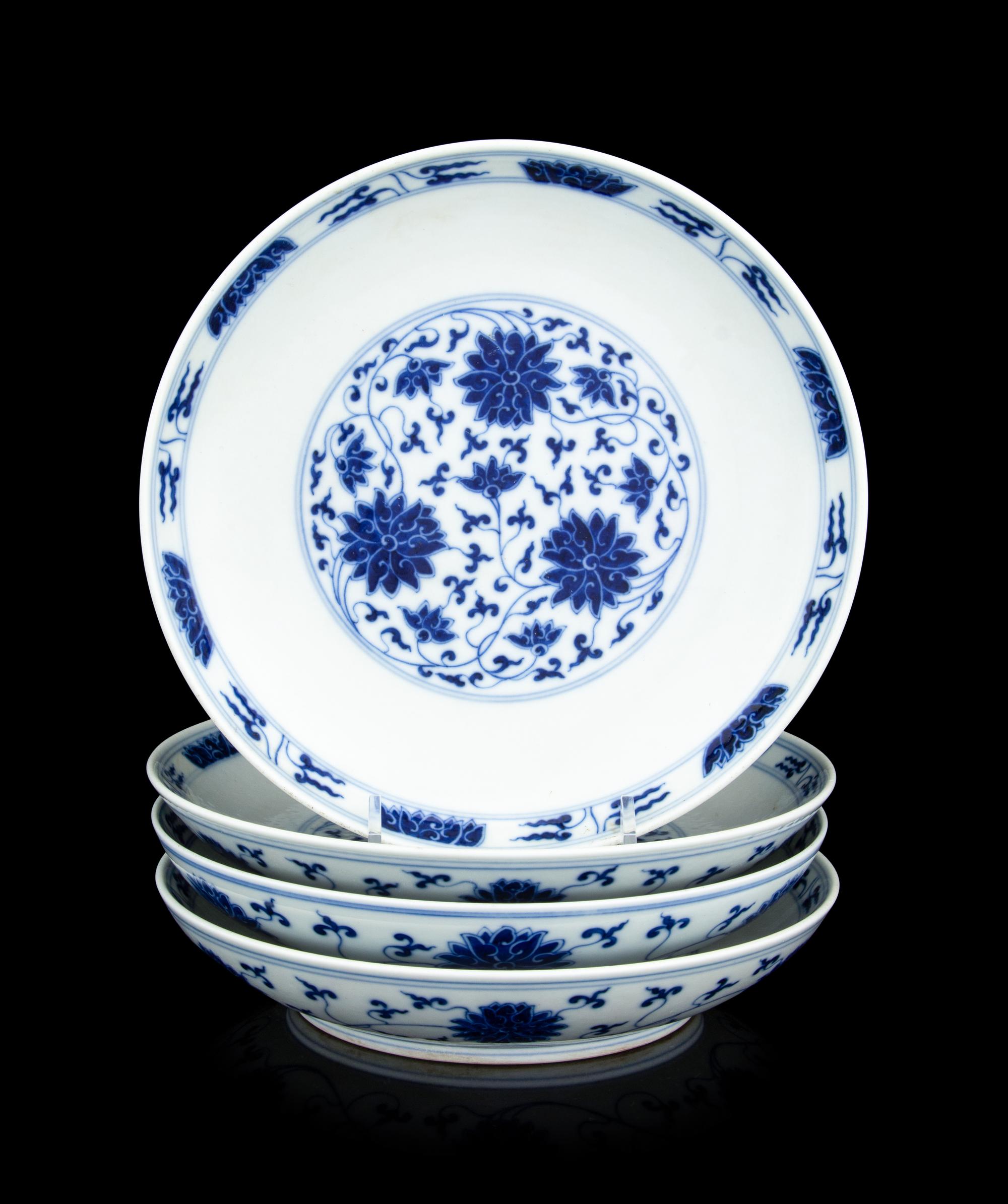 Four Chinese Blue and White Porcelain 'Lotus' Plates