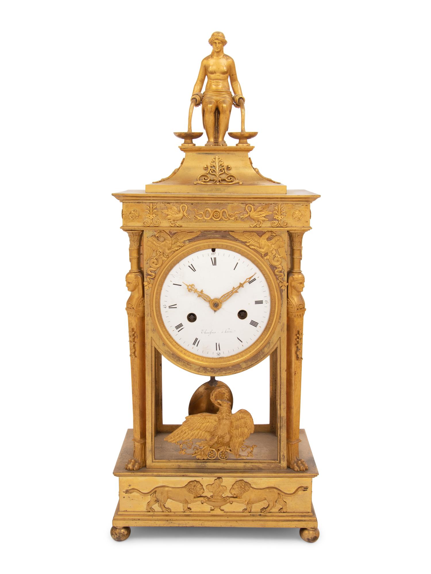 An Empire Gilt Bronze Figural Mantel Clock