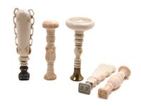 A Collection of Ivory Seals, Height of tallest 3 3/4 inches.