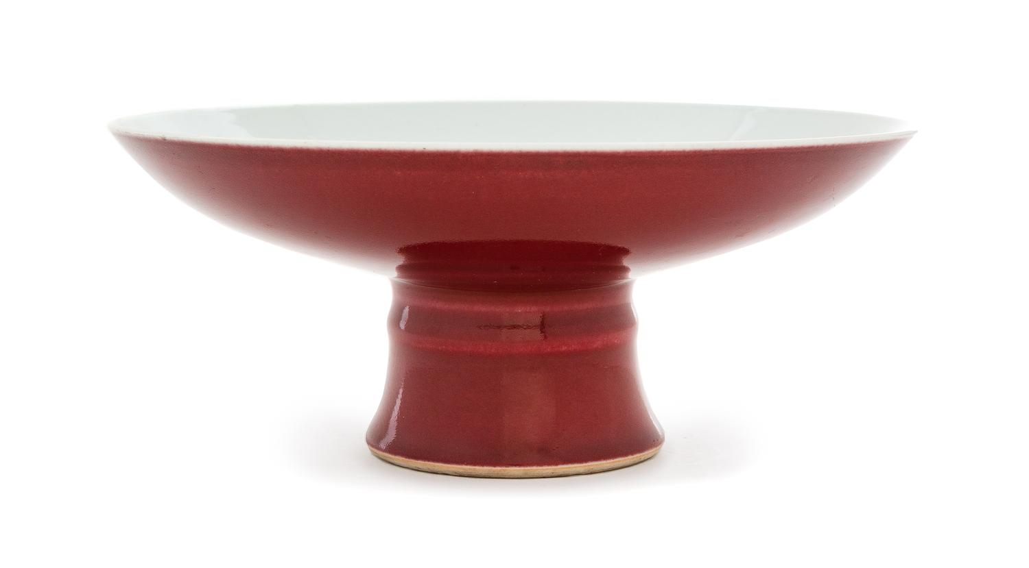 A Chinese Copper Red Glazed Porcelain Tazza Diameter 8 1/2 inches. — QIANLONG PERIOD (1736-1795)