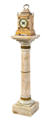 A French Champleve and Onyx Mantel Clock, Height overall 55 1/4 x height of clock 15 1/4 inches.