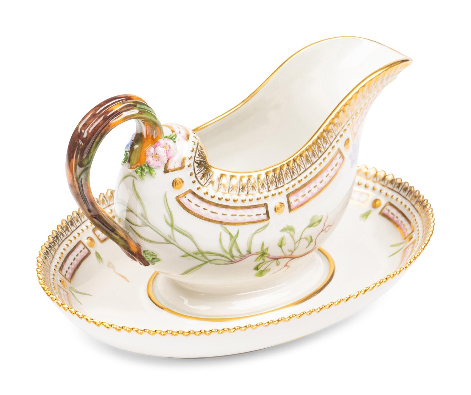 A Royal Copenhagen Flora Danica Porcelain Sauce Boat and Fixed Stand