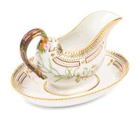 A Royal Copenhagen Flora Danica Porcelain Sauce Boat and Fixed Stand